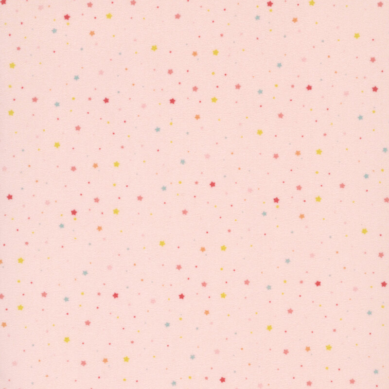 blush pink fabric with a delicate pattern of small multicolor stars