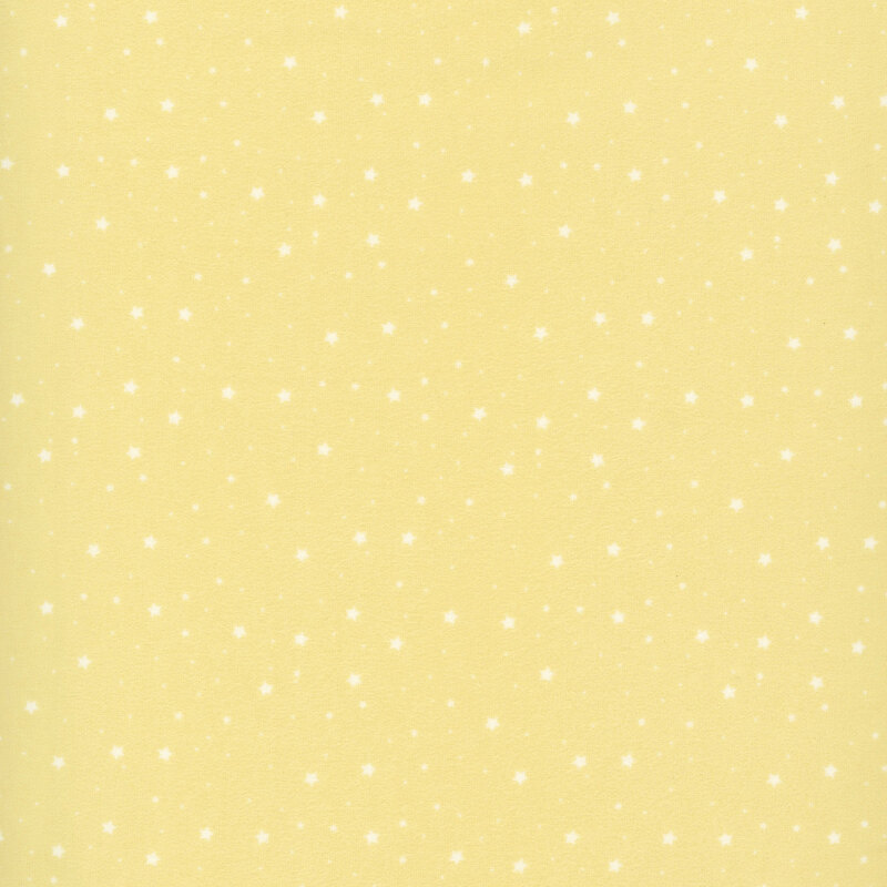 daffodil yellow fabric with a delicate pattern of small white stars