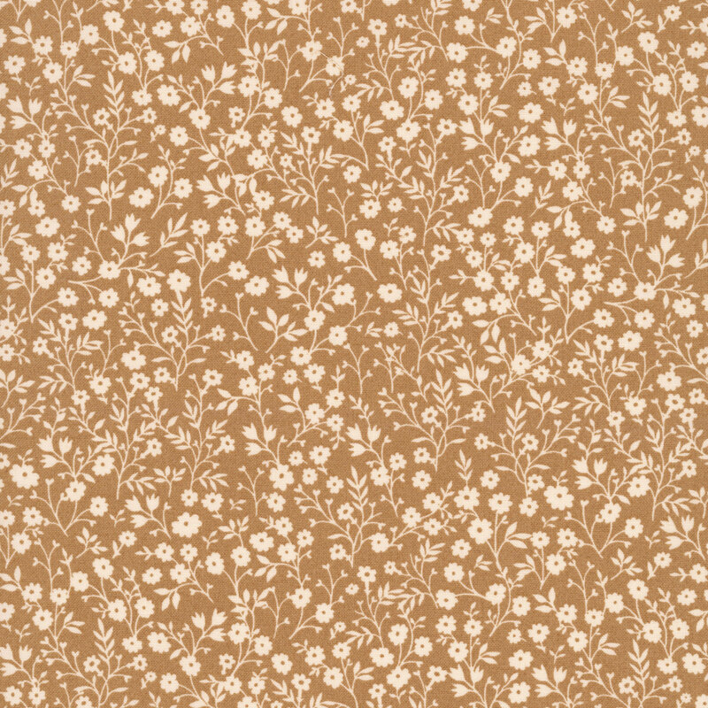 Maple brown fabric with a dense pattern of cream flowers and stems