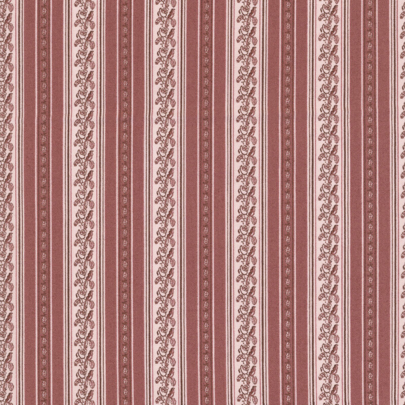 Dark cherry fabric featuring cream colored vertical stripes with decorative leaf motifs
