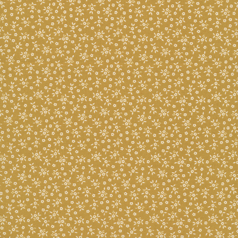 Gold fabric tossed with delicate flowers cream flowers.