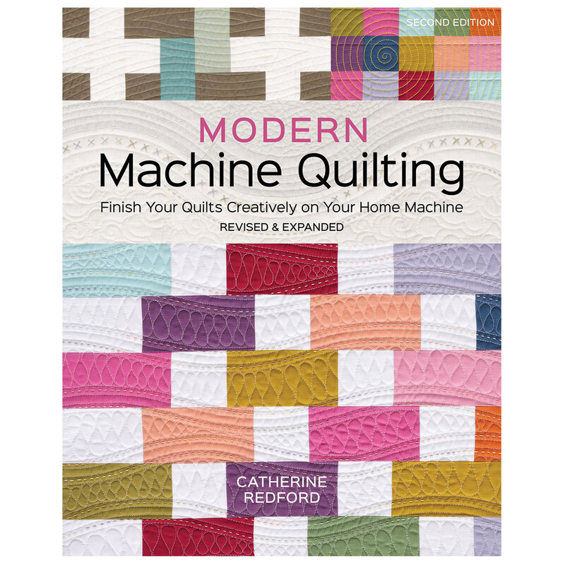 The front of Modern Machine Quilting book featuring a completed patchwork quilt with intricate quilting detail.