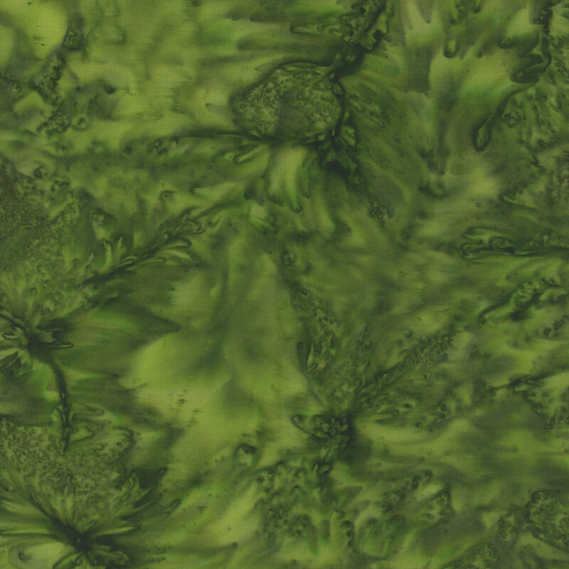 Marbled batik fabric in shades of emerald green.