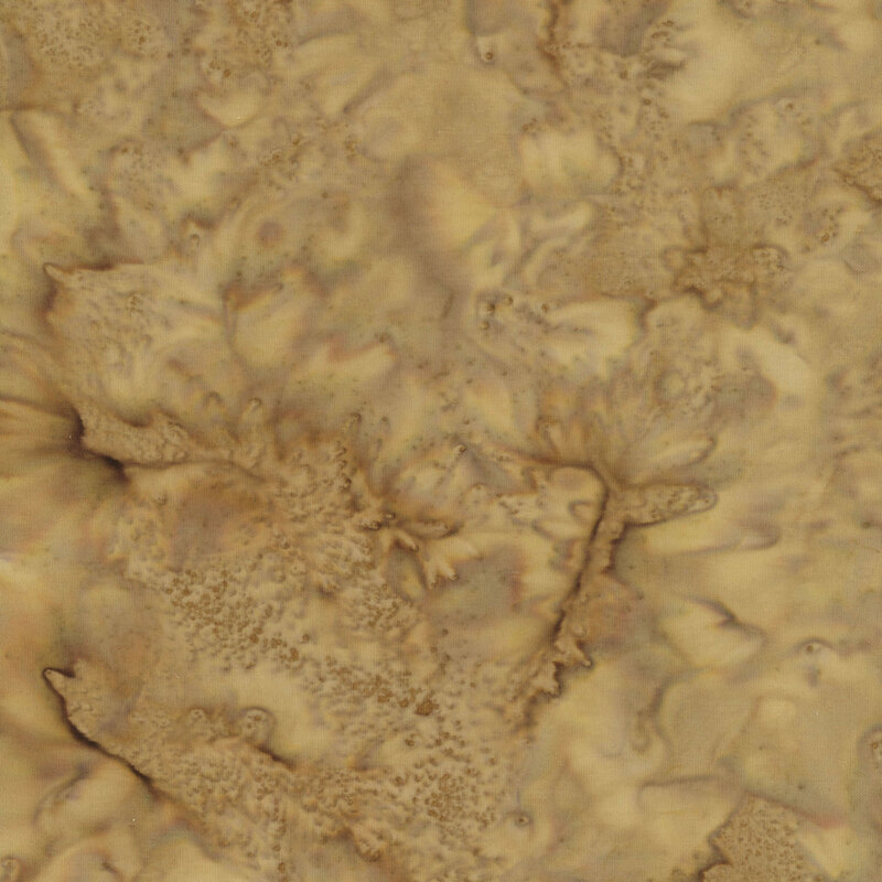 Marbled batik fabric in shades of earth brown.