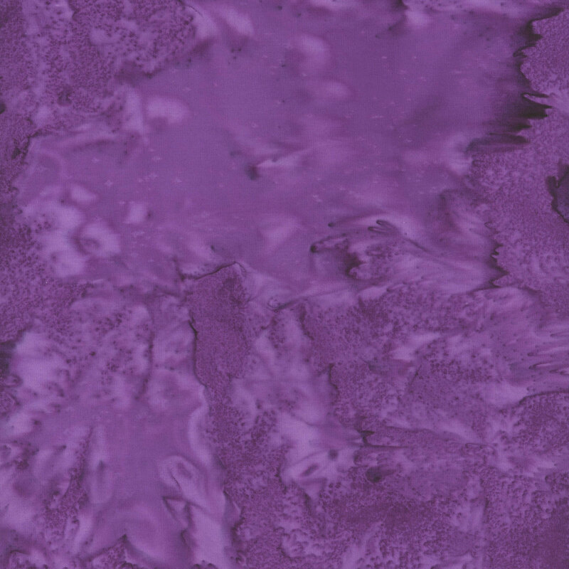 Marbled batik fabric in shades of purple.