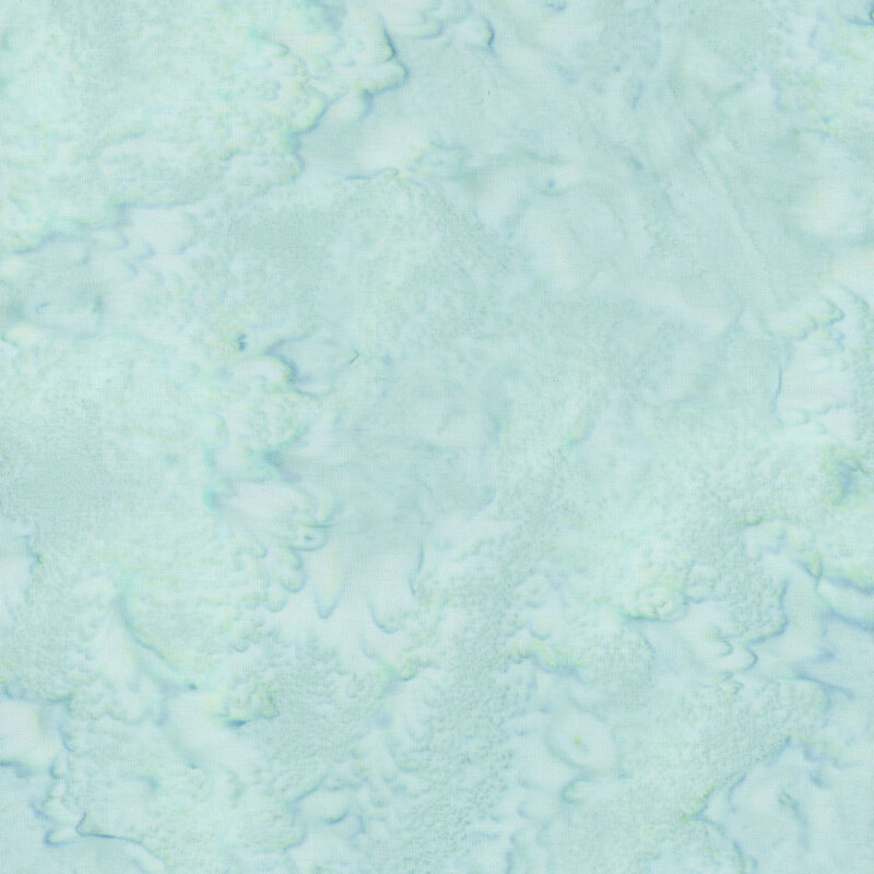 Marbled batik fabric in shades of mint aqua.