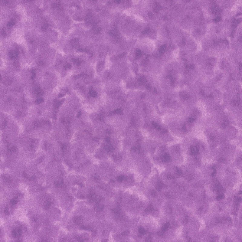 Mottled dark magenta fabric.