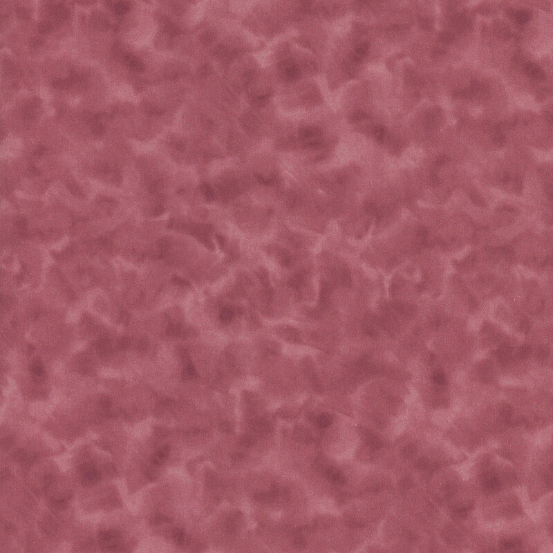 Mottled dark rose fabric.