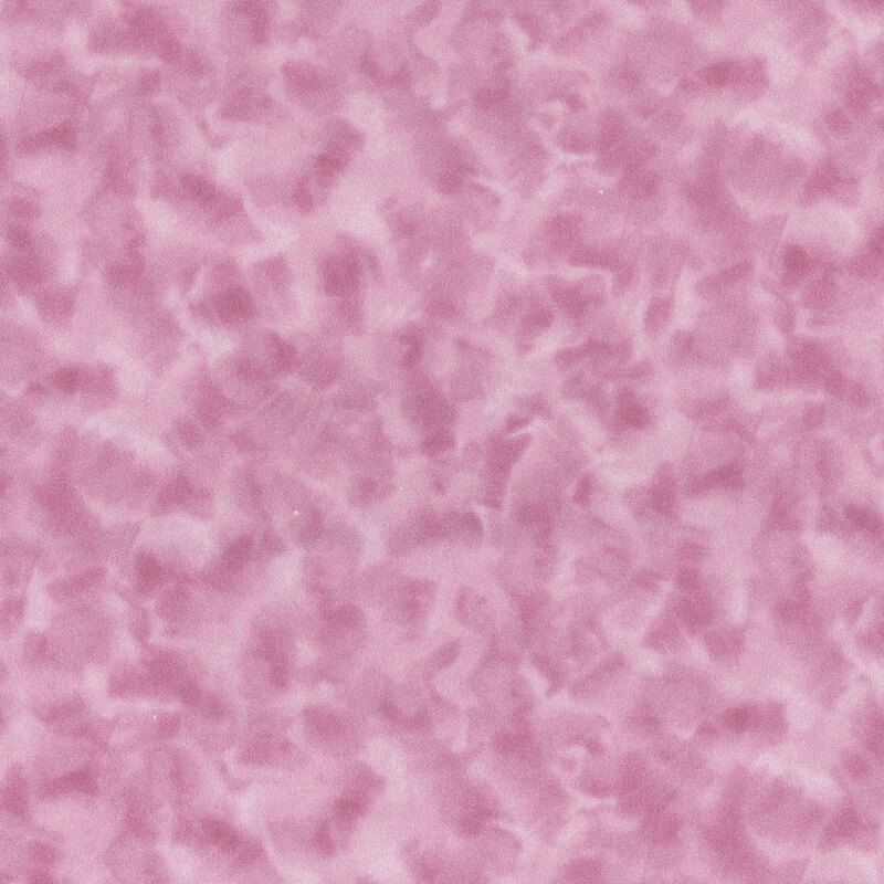 Mottled dusty mauve fabric.