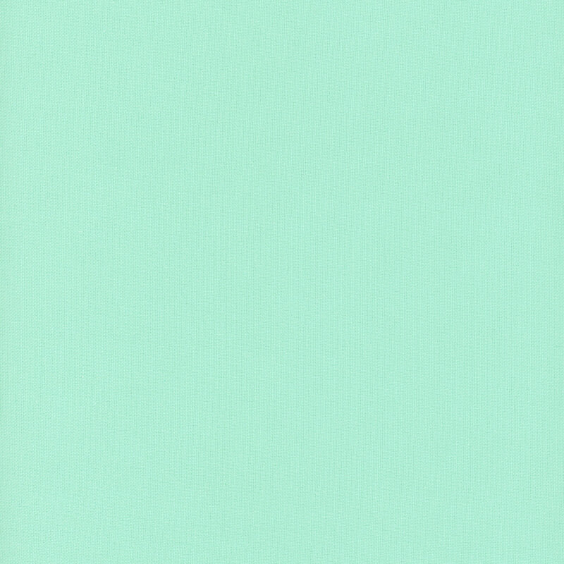 Swatch of solid, bright aquamarine flannel fabric 