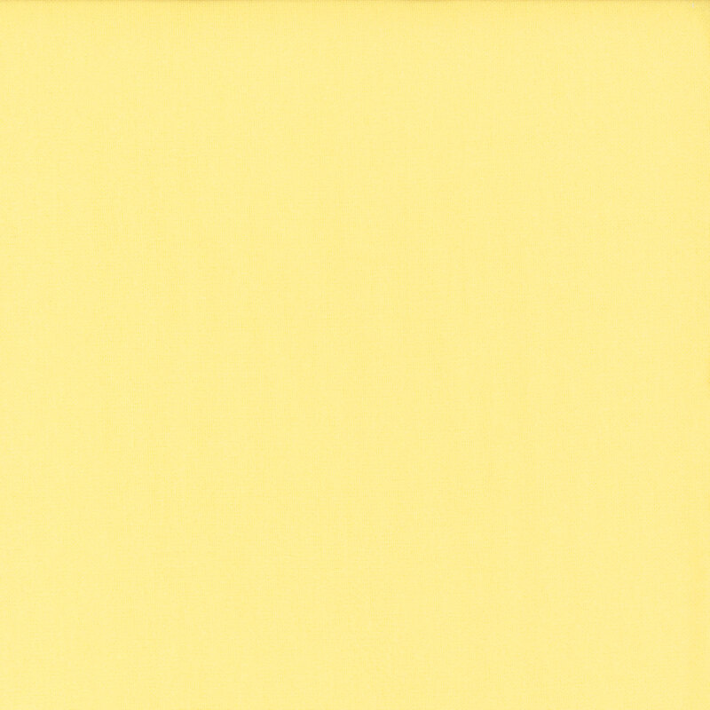 Swatch of solid, pastel yellow flannel fabric 