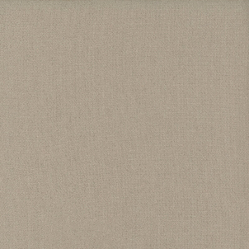 Swatch of solid, warm gray flannel fabric 