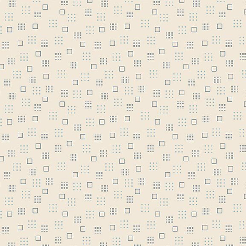Cream fabric with a pattern of blue cubes and dots 
