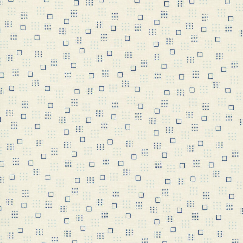 soft cream fabric with a pattern of blue cubes and dots 