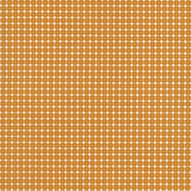 Dark gold fabric with overlapping yellow and cream lines and small cream X shapes