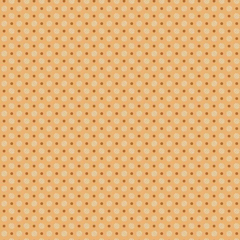 Golden yellow fabric with a pattern of gold dots and striped, cream circles