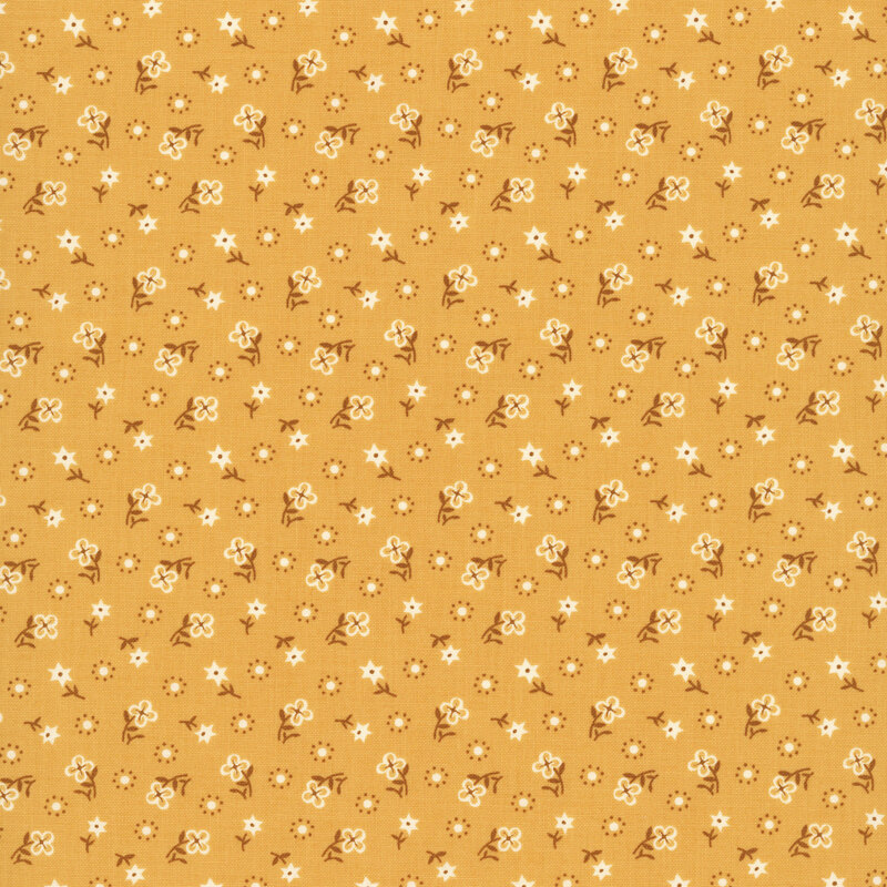 Honey yellow fabric with a tossed pattern of white florals with brown stems, white and brown dots