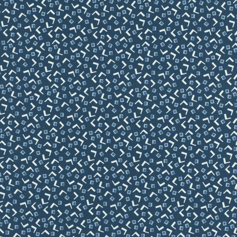 Dark navy fabric with an abstract design of white V shapes and faded blue squares