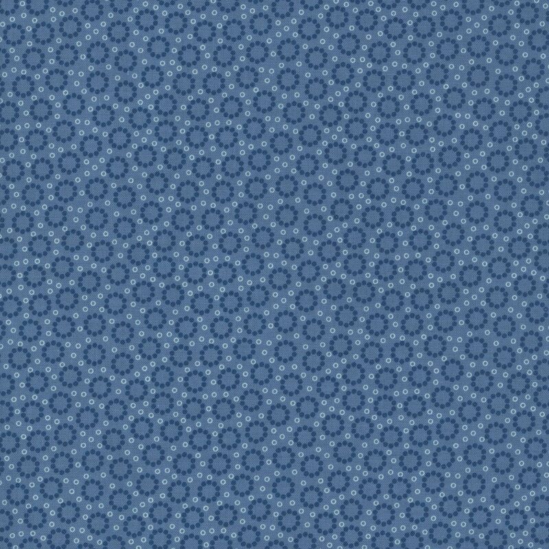 Primitive navy blue and white circles on a denim blue background