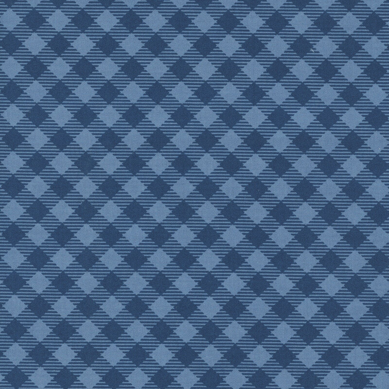 A denim blue fabric with navy buffalo checks