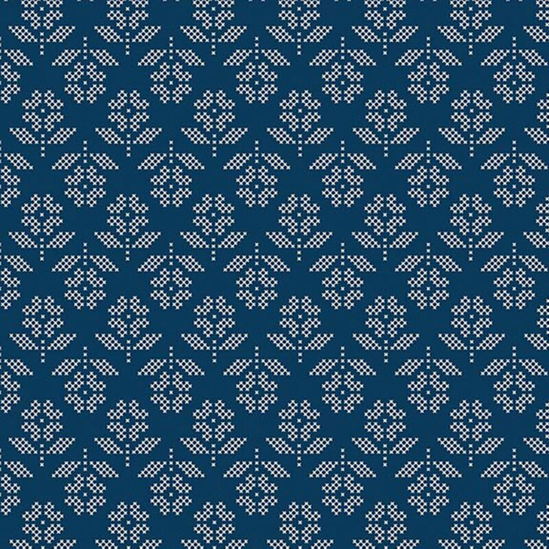 Dark navy fabric with a cross-stitch style pattern of off-white daisies