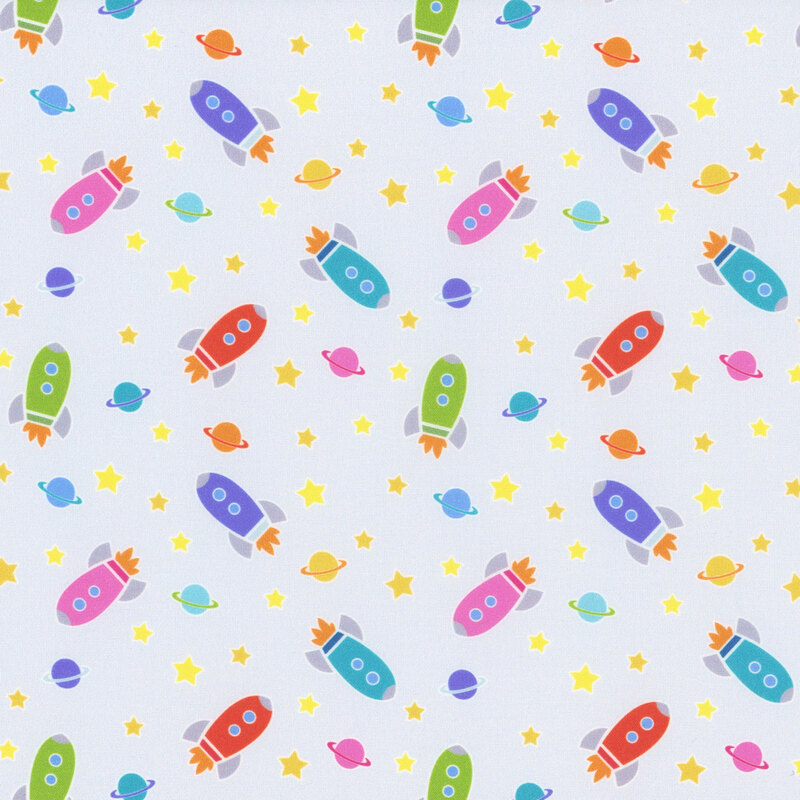 Light gray fabric with a tossed pattern of colorful rockets, planets, and glowy stars