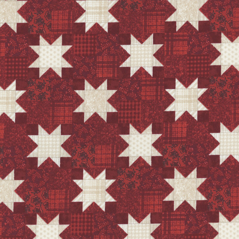 Cream-toned patchwork stars on a patchwork-style maroon red fabric