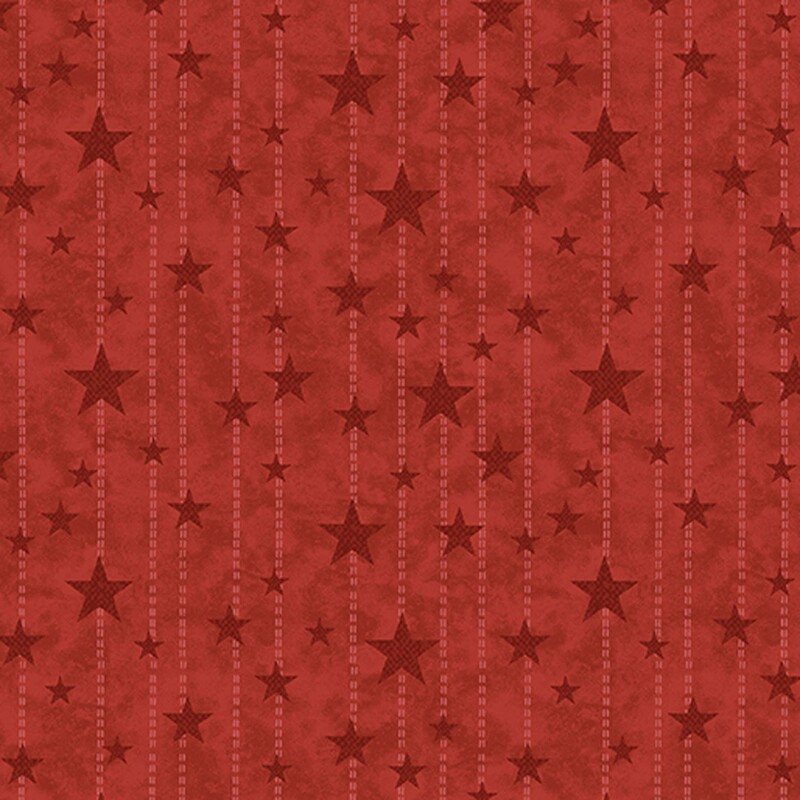 Mottled tomato red fabric with tonal dotted lines and small, medium, and large maroon stars