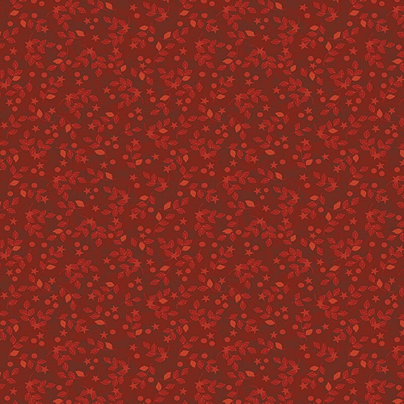 Scarlet fabric with tonal leaves and tiny stars and circles
