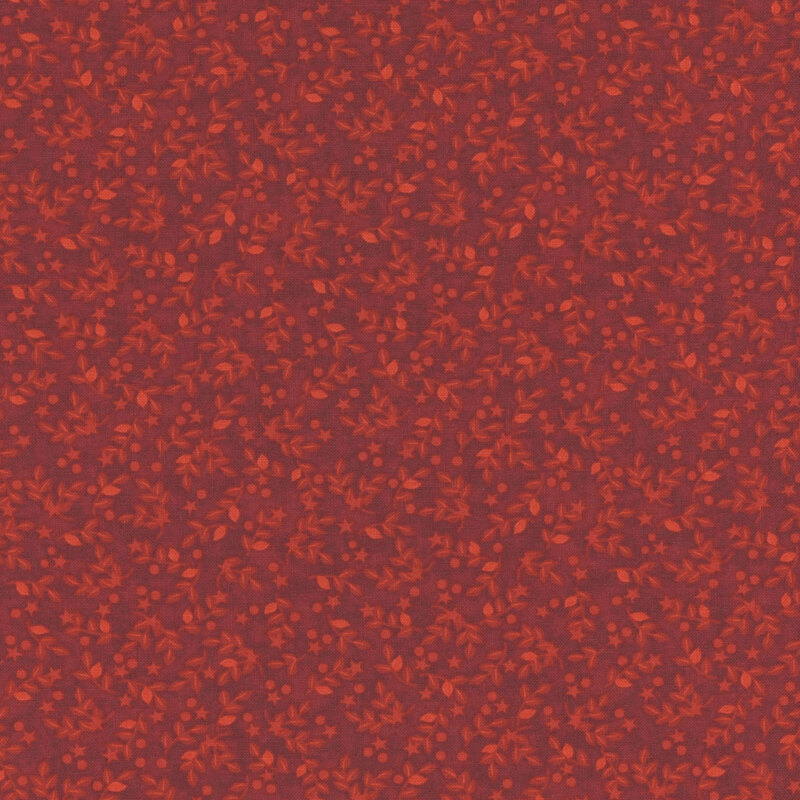 Scarlet fabric with tonal leaves and tiny stars and circles