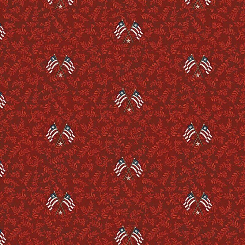Mottled maroon fabric with tonal scarlet leaves and a pattern of striped flags and silver stars