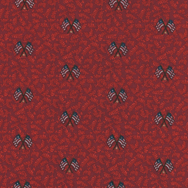 Mottled maroon fabric with tonal scarlet leaves and a pattern of striped flags and silver stars