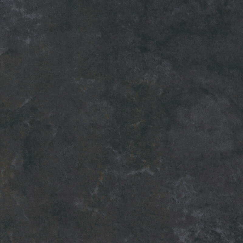 A swatch of black flannel fabric with a mottled pattern.