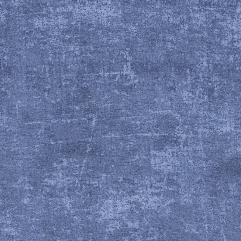 A swatch of denim flannel fabric with a grunge texture.