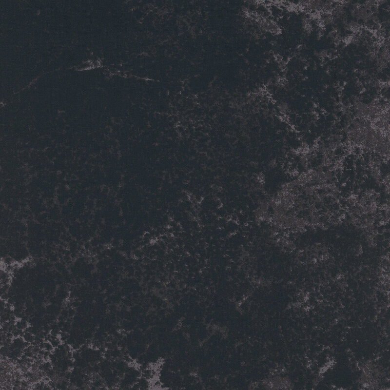 A swatch of black fabric with a grunge texture.