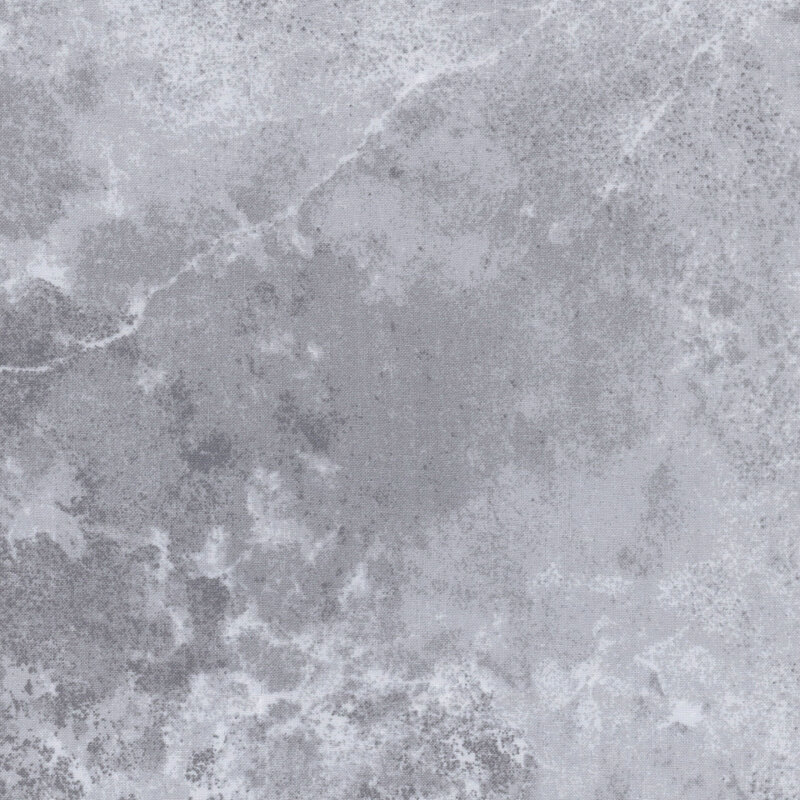 A swatch of gray fabric with a grunge texture.