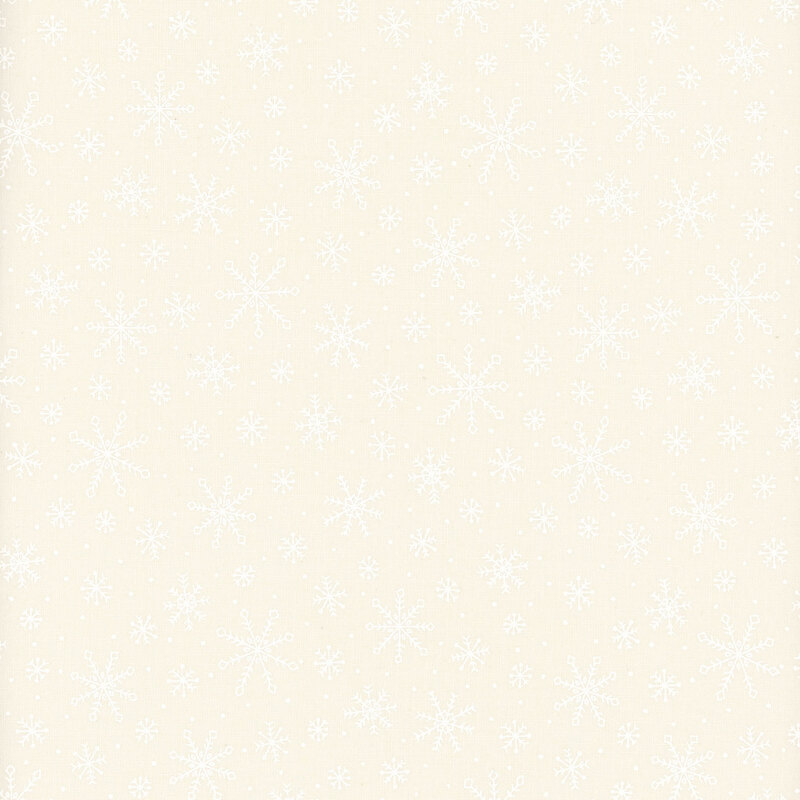 White on cream muslin fabric featuring snowflakes.