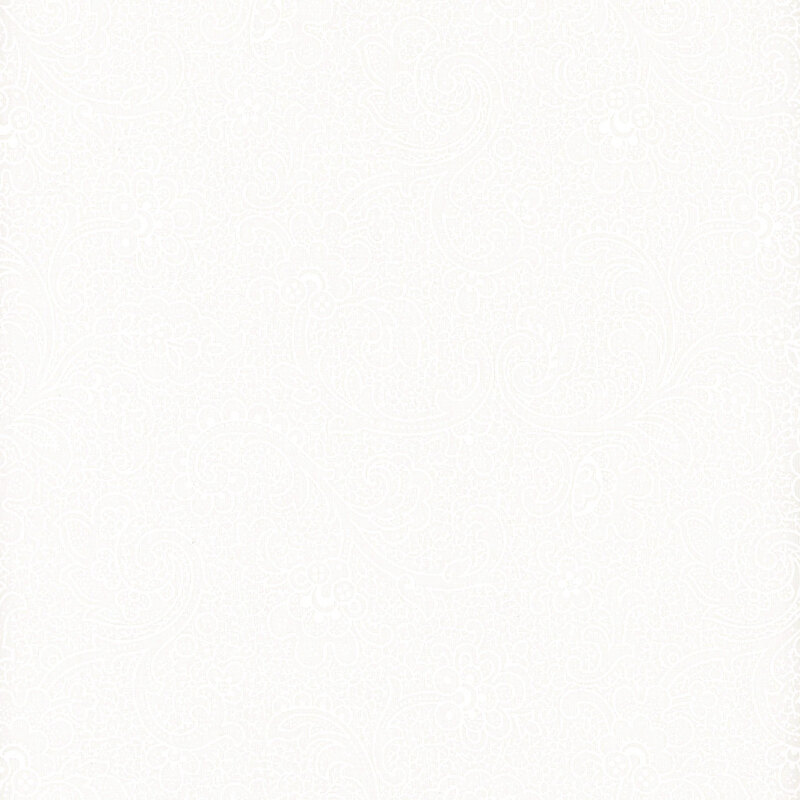 White on white muslin fabric featuring ornamental florals and leaves.