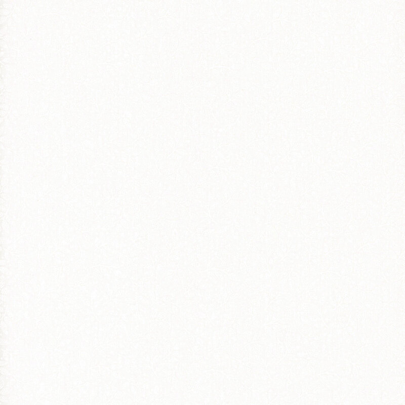 White on white muslin fabric packed with small leafy sprigs.