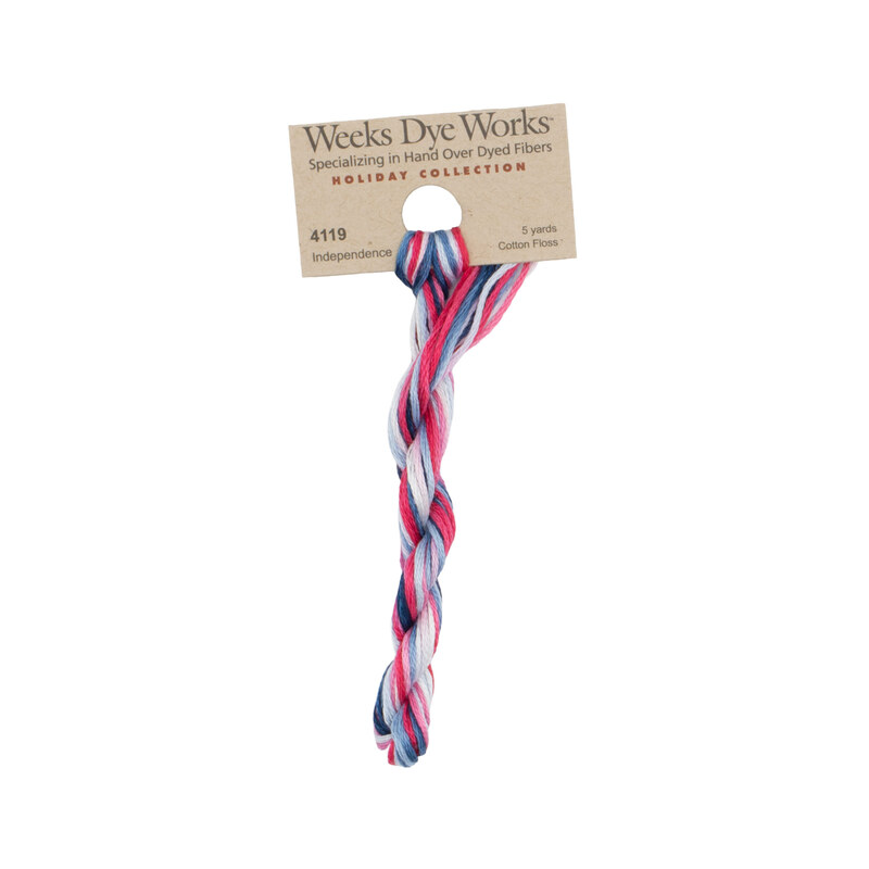 A skein of Variegated Red, White, and Blue embroidery floss, twisted and bundled, with a tan label featuring the brand name and color information.