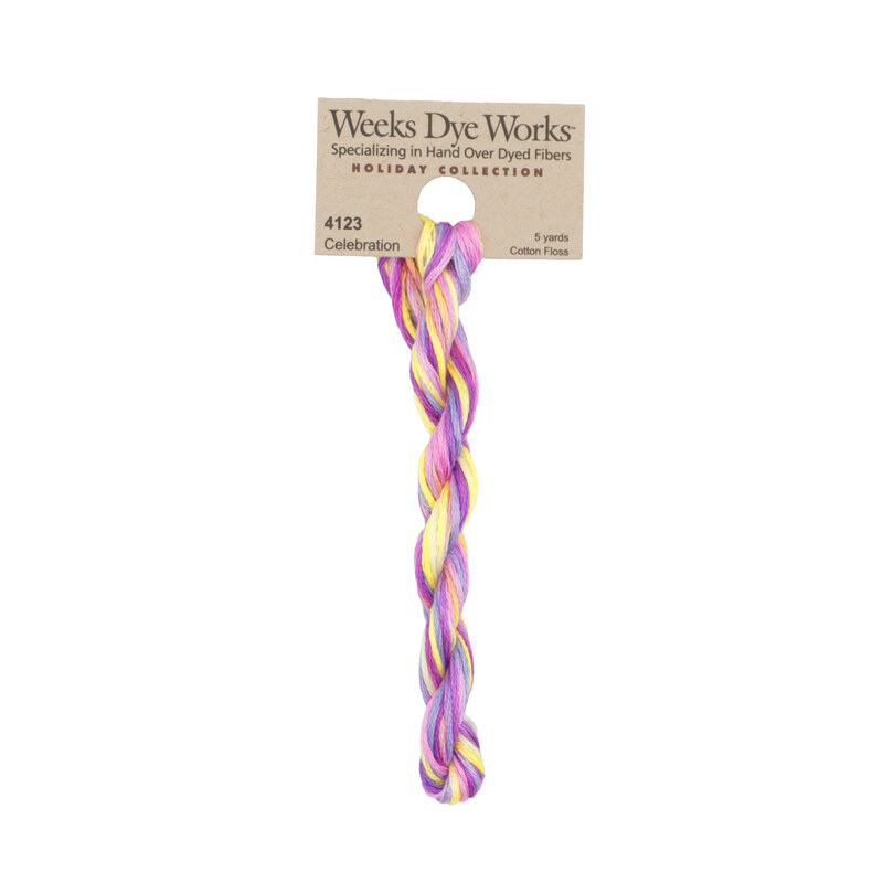 A skein of Variegated Bright Pink, Yellow, and Purple embroidery floss, twisted and bundled, with a tan label featuring the brand name and color information.