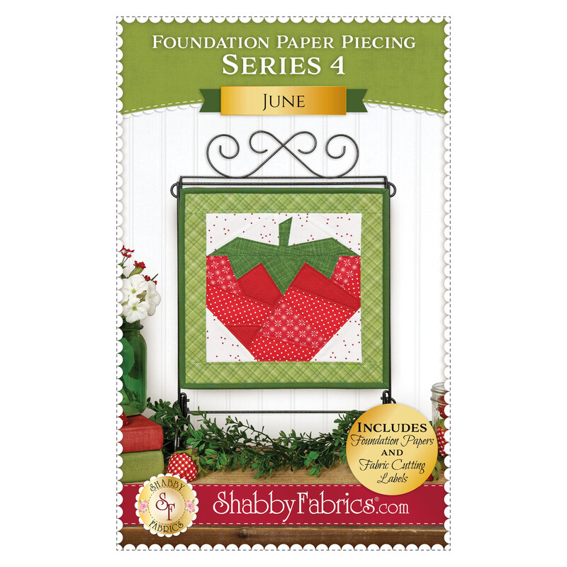 Front cover of the pattern featuring the completed project in red, white, and green fabrics, surrounded by coordinating décor.