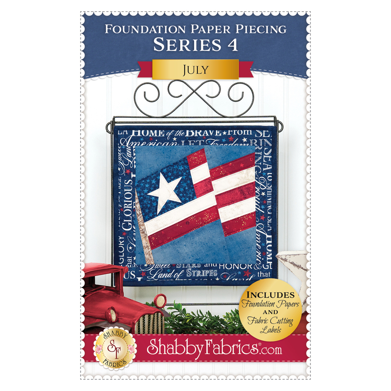 Front cover of the pattern showing the completed project in red, white, and blue fabrics, displayed on a craft stand.
