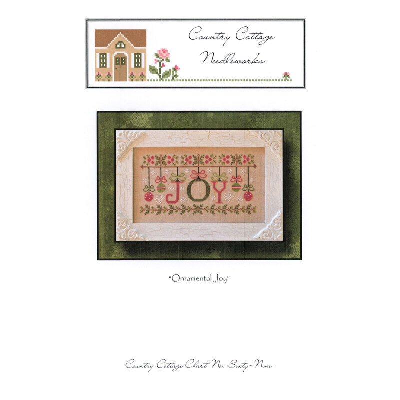 Packaging illustration for Ornamental Joy stitch kit, featuring the word JOY decorated with flowers.