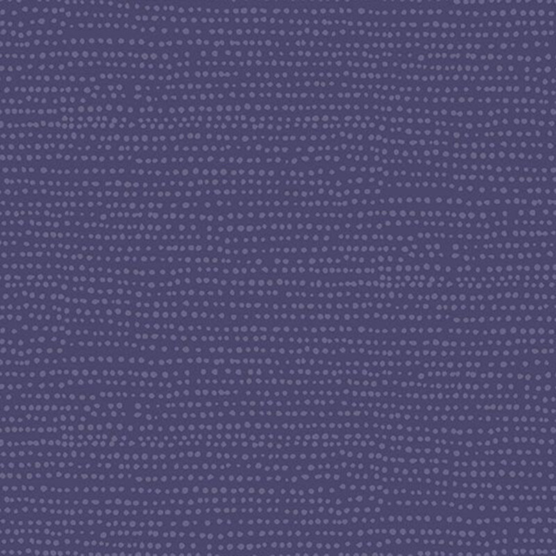 Flannel fabric featuring rows of tonal dots on a violet blue background.
