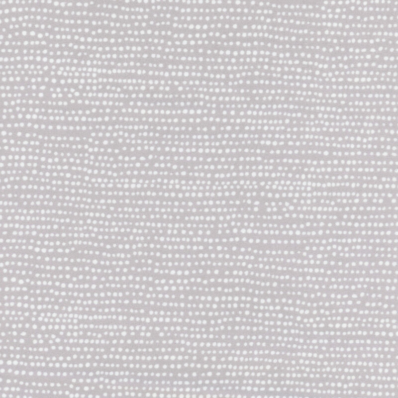 Flannel fabric featuring rows of white dots on a cloud gray background.