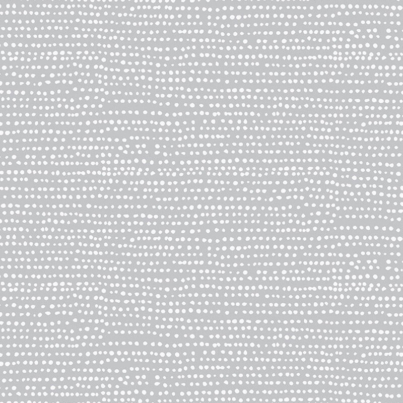 Flannel fabric featuring rows of white dots on a cloud gray background.