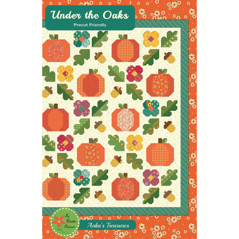 Front of the Under the Oaks pattern showing a digital image of the completed quilt in autumn orange, green, and teal tones featuring pumpkins, and the title across the top