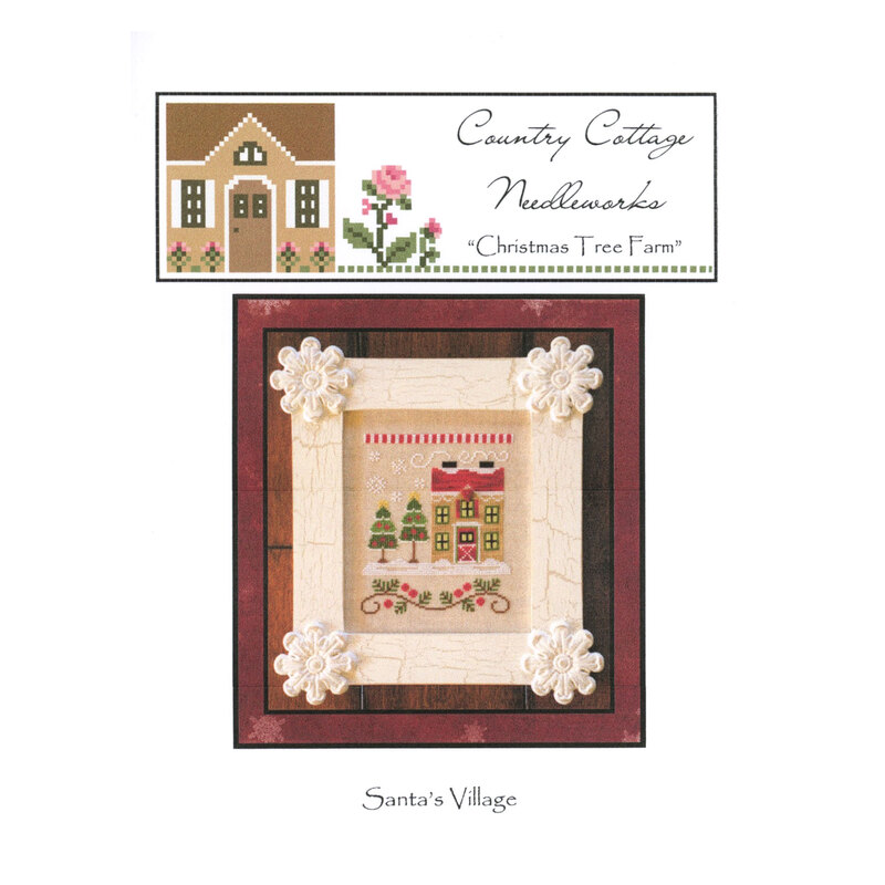 The front image of the "Christmas Tree Farm" cross stitch pattern featuring snowy Christmas trees and a farm house.