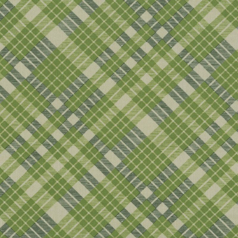 A plaid pattern fabric swatch in hues of olive, hunter, and greige